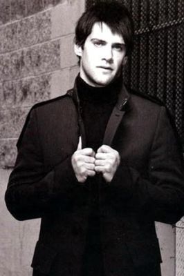 Uomo Elegante in Giacca Nera