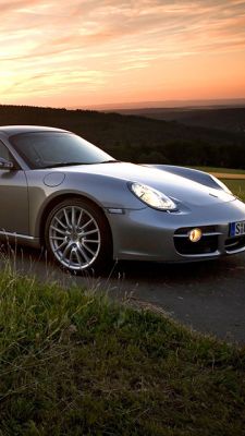 Auto sportivo argento al tramonto - wallpaper preview